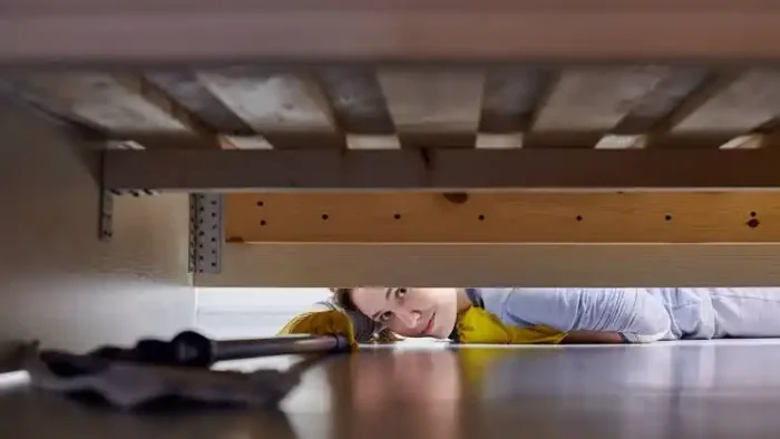 How do you vacuum under your bed?
